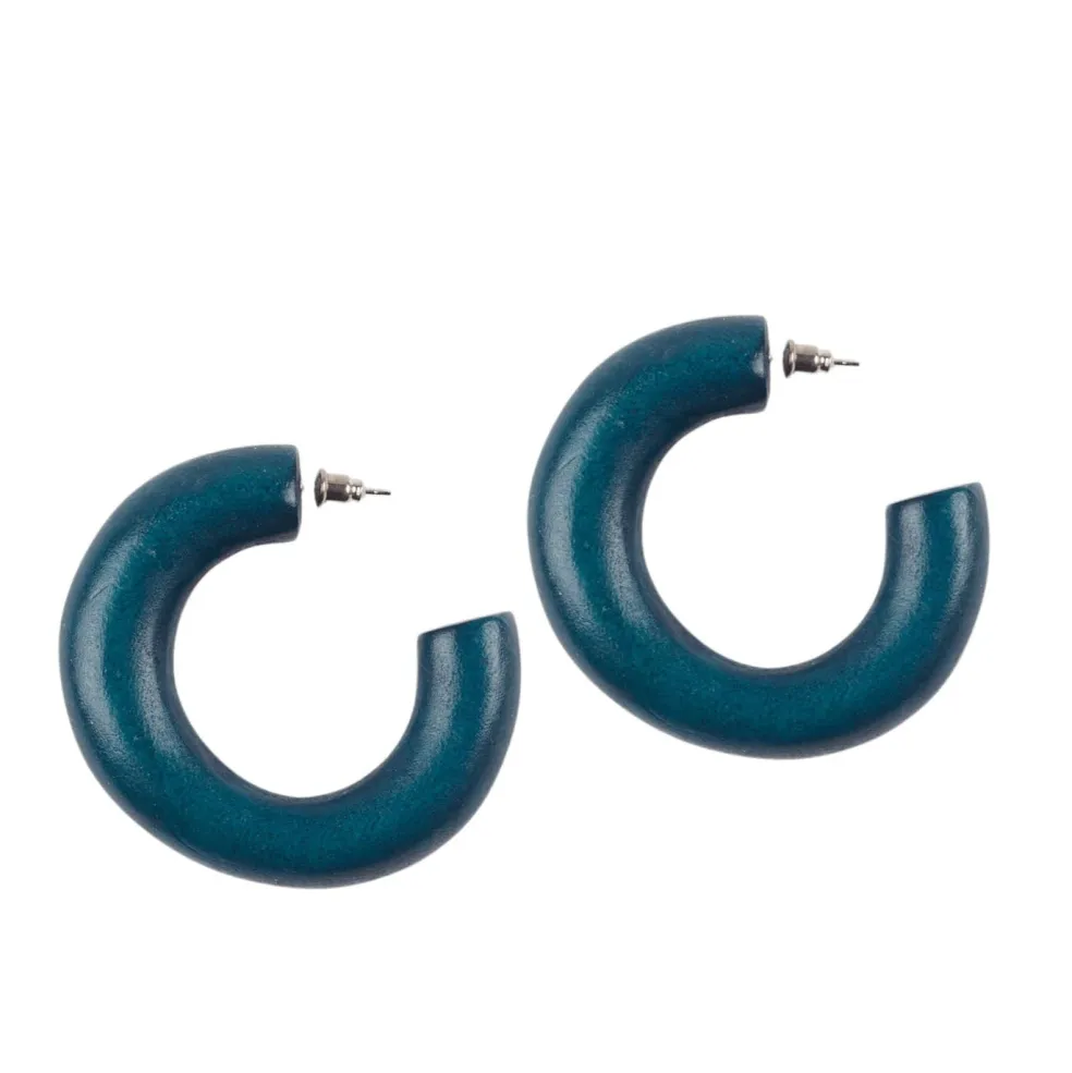 orecchini_legno_a_cerchio_2.webp Orecchini Legno a cerchio Gullfoss