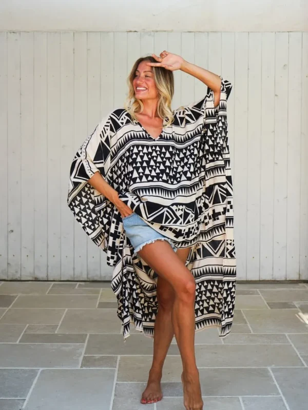 Poncho corto davanti lungo dietro rayon Lien